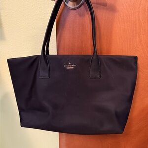 Kate Spade Catie Black Nylon Tote with striped interior.
